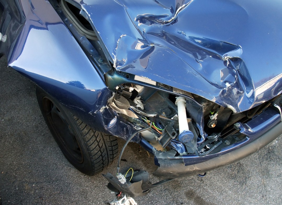 Blue Nissan collision repair in southwest Edmonton
