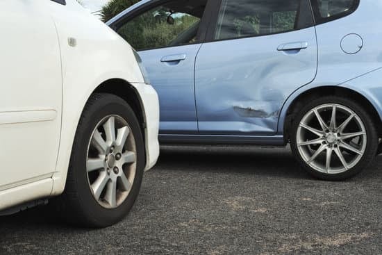 Denting Doors at collision repair in Leduc